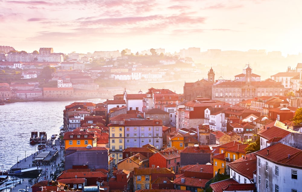 Antique,Town,Porto,,Portugal.,Sunset,Sun,Over,Silhouettes,Skyline,Of